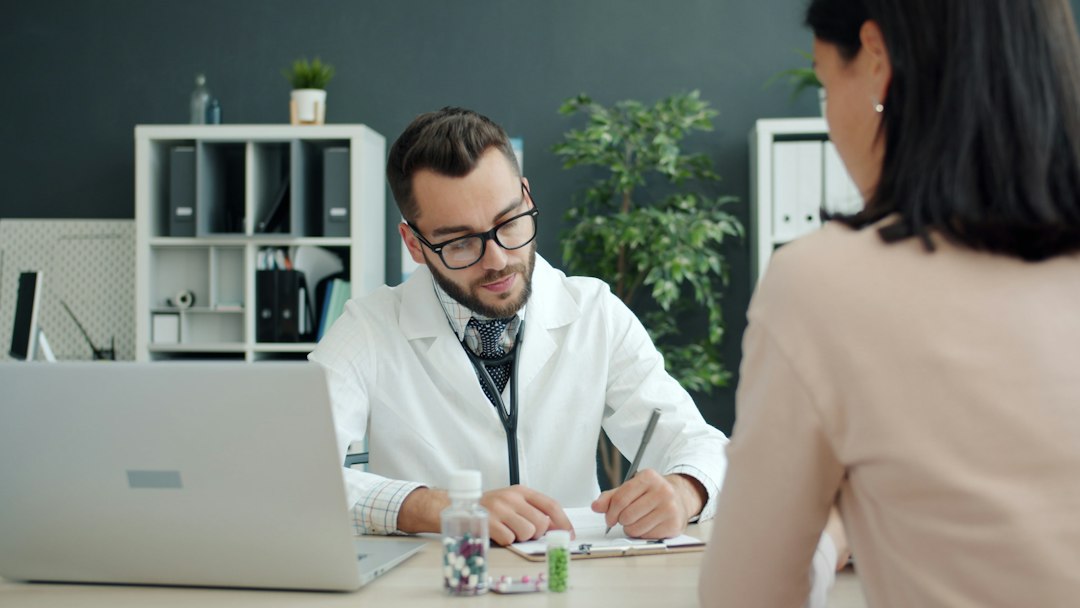 Doctor consulting a patient in a modern clinic setting